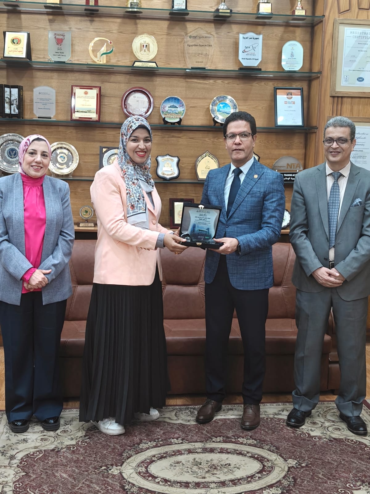 In Recognition of Her Research and Academic Excellence: Benha University President Honors a Teaching Assistant in the Pediatric Nursing Department